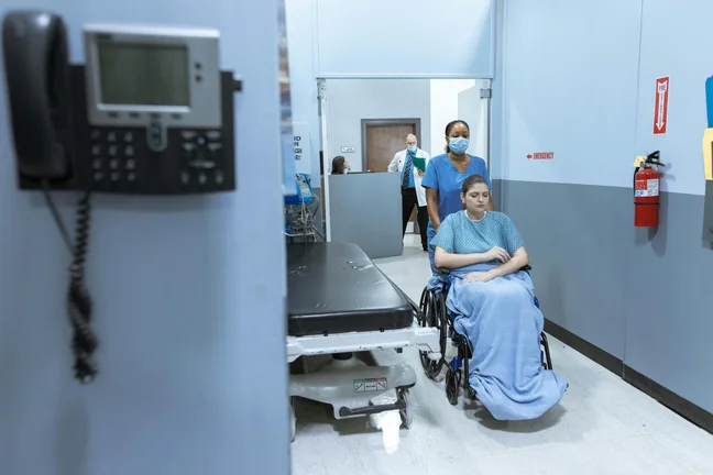 Nurse empowering a specially‑abled patient during care